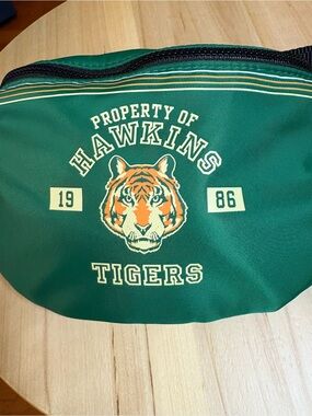 limited-edition MAC Cosmetics x Stranger Things Hawkins Tigers waist bag,